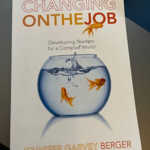 Photo of book titled "Changing on the Job"