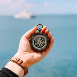 Compass in hand for blueprint